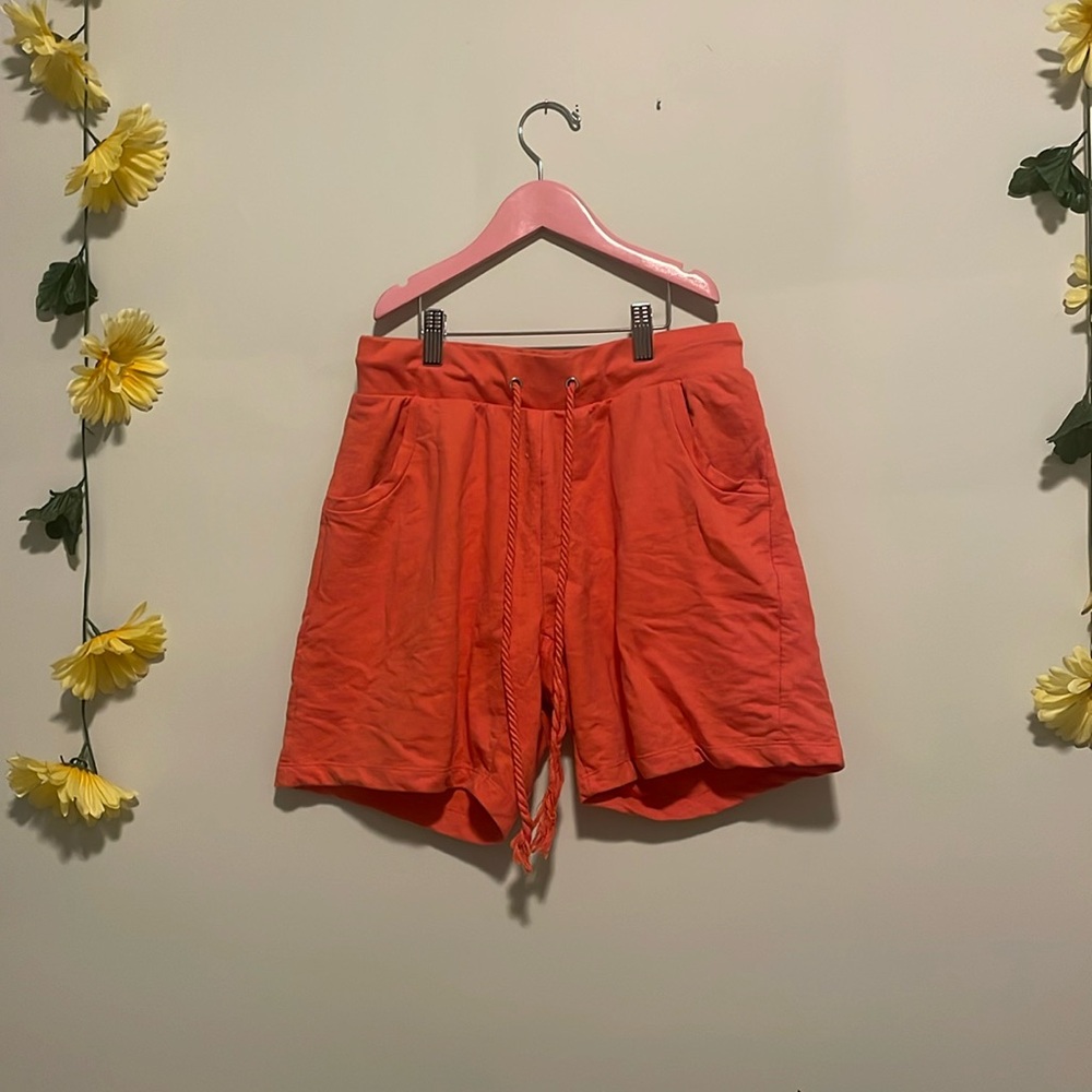 Orange sweatpant shorts
